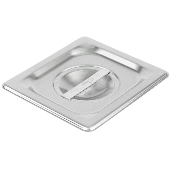 A Vollrath stainless steel lid on a pan.