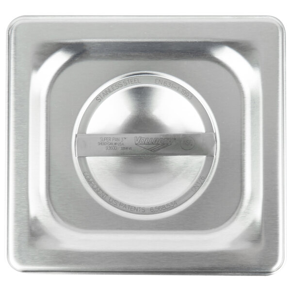 A Vollrath stainless steel lid on a 1/6 size pan.