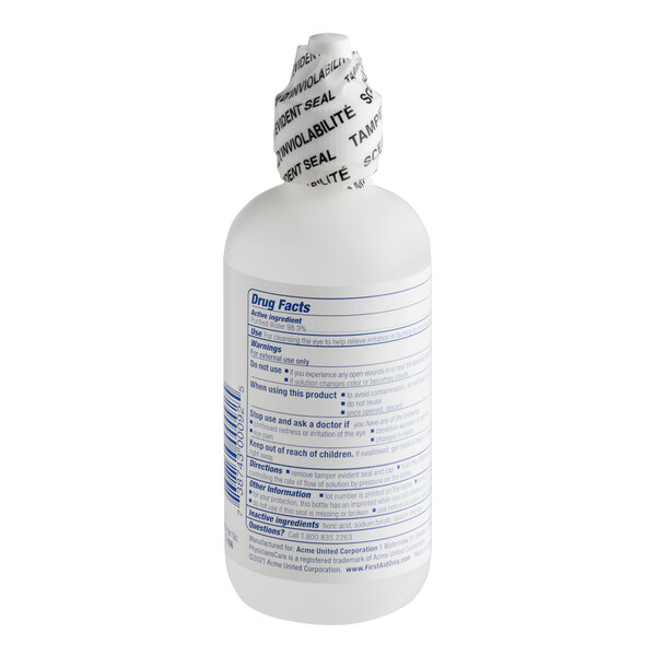 A white plastic 4 oz. eyewash bottle with a tamper-evident seal and drug facts label.
