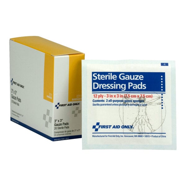 A box and a packet of First Aid Only 3x3 inch sterile gauze pads.