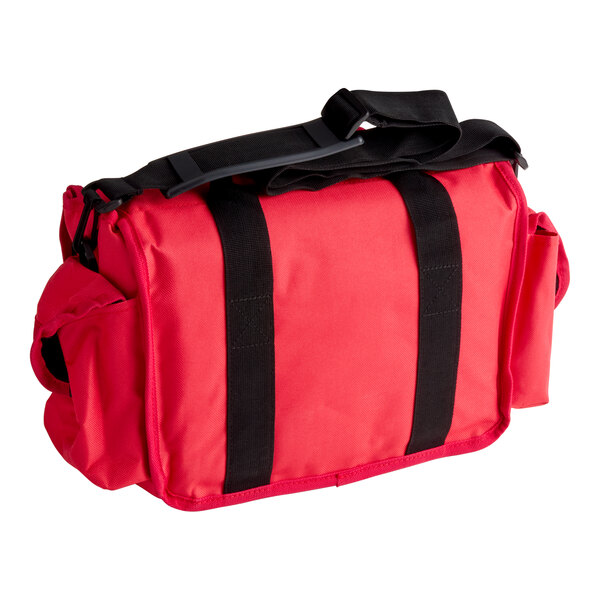 A large red nylon EMT bag with black straps and side pockets, designed for first responder use.