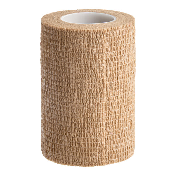 A roll of tan elastic bandage wrap with a textured surface and a white inner core.