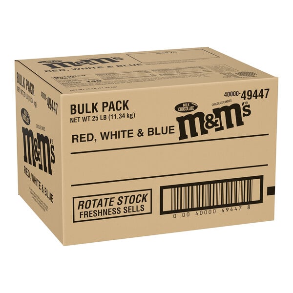 A bulk cardboard box of red, white, and blue M&M's milk chocolate candies weighing 25 pounds.