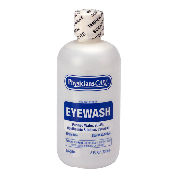 A plastic bottle of PhysiciansCare eyewash solution with a tamper-evident seal.