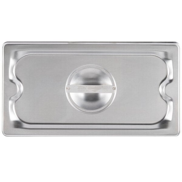 A Vollrath stainless steel pan with a solid lid.