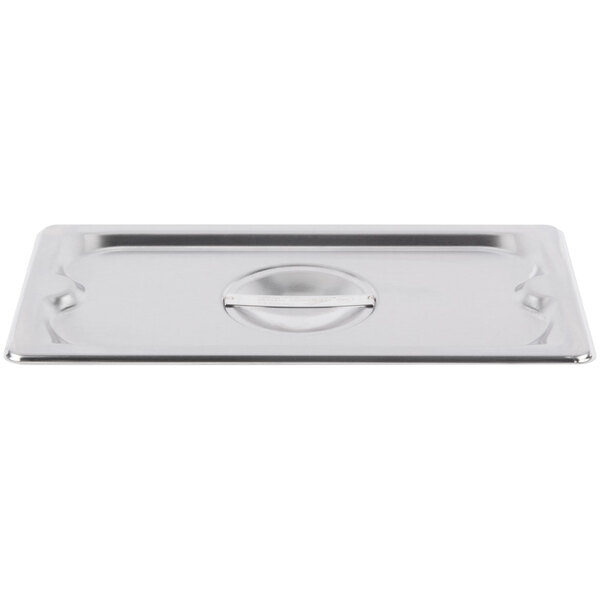 A Vollrath stainless steel steam table pan cover on a stainless steel pan.