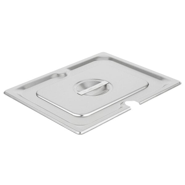A silver metal Vollrath stainless steel slotted cover with a hole.