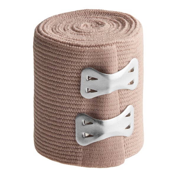 A rolled 2-inch by 5-yard elastic bandage wrap with two metal fasteners.
