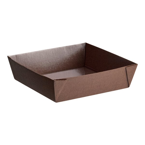 A square brown paper baking mold with raised sides.