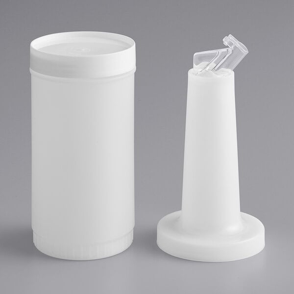 A white 1-quart pour bottle with a flip top and cap, shown disassembled into its main components.