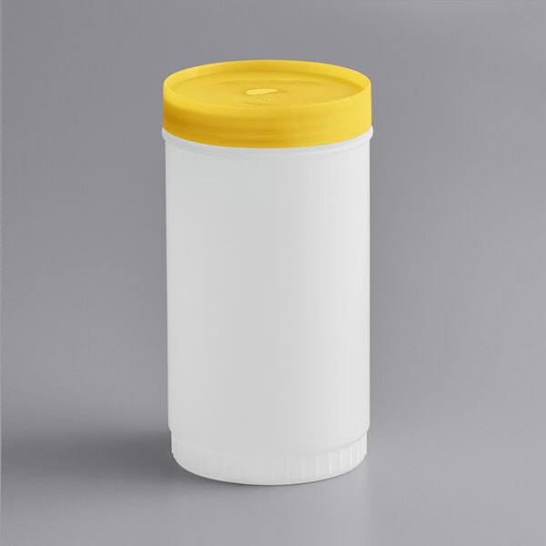 A white quart-sized backup container with a yellow cap.