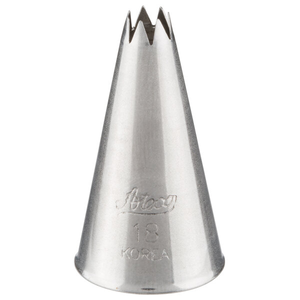A stainless steel open star piping tip used for cake and pastry decorating.
