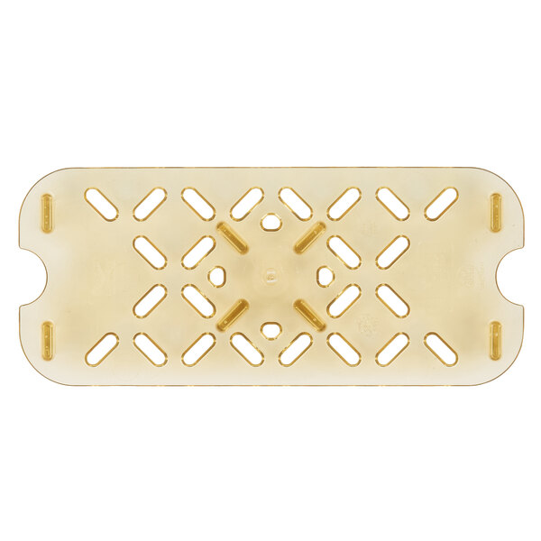 A Vollrath Super Pan plastic rectangular drain tray with holes.