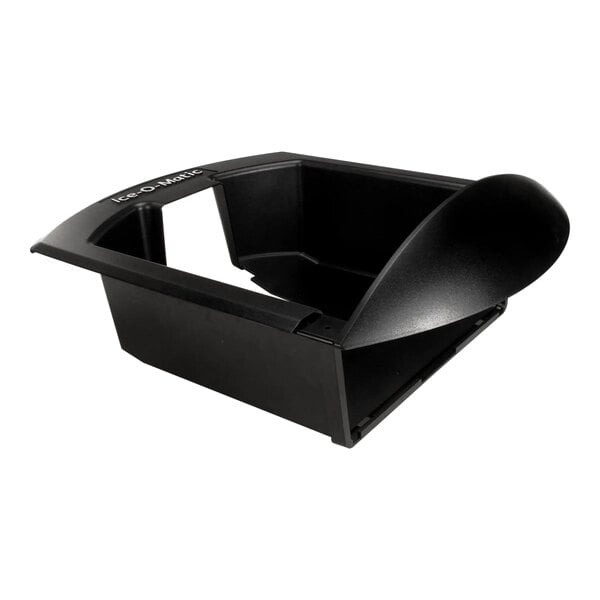 A black plastic dispense housing component for an Ice-O-Matic ice dispenser.