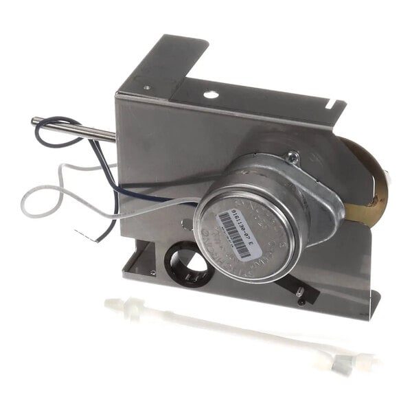 A metal Ice-O-Matic harvest kit with attached wiring and a plastic component, designed for 230V operation at 60 degrees.