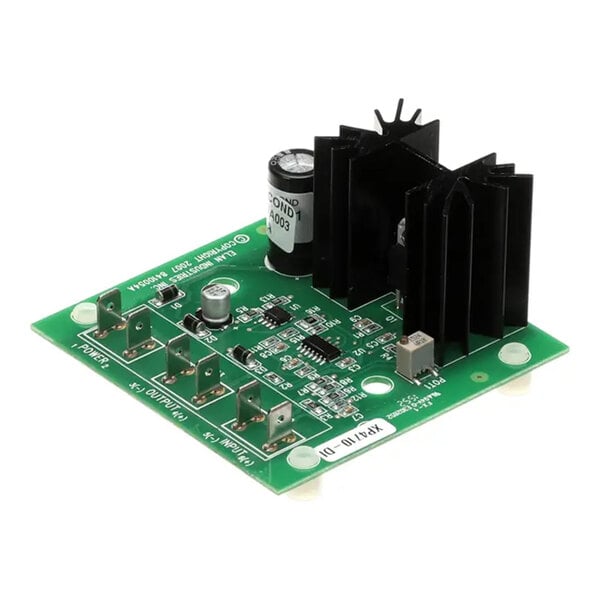 A green electronic circuit board with various components, including a large black heat sink, capacitors, and terminal connectors, used as a signal conditioner.