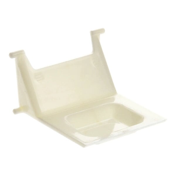 A white plastic replacement door part for an Ice-O-Matic ice machine.