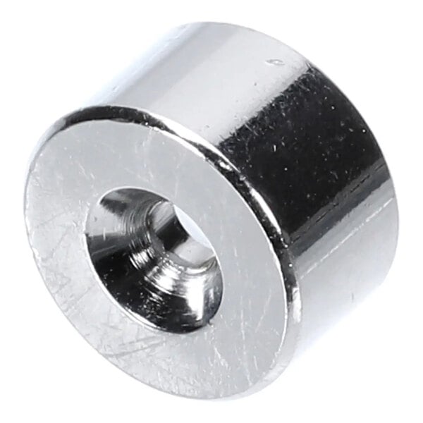 A cylindrical steel slug with a central hole, used as a window component for XLT Ovens.