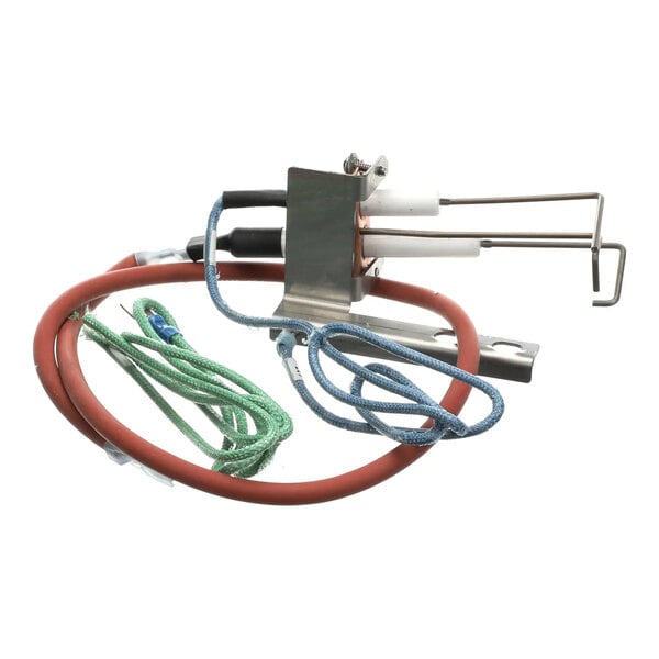 A round oven kit with attached wires and metal components.