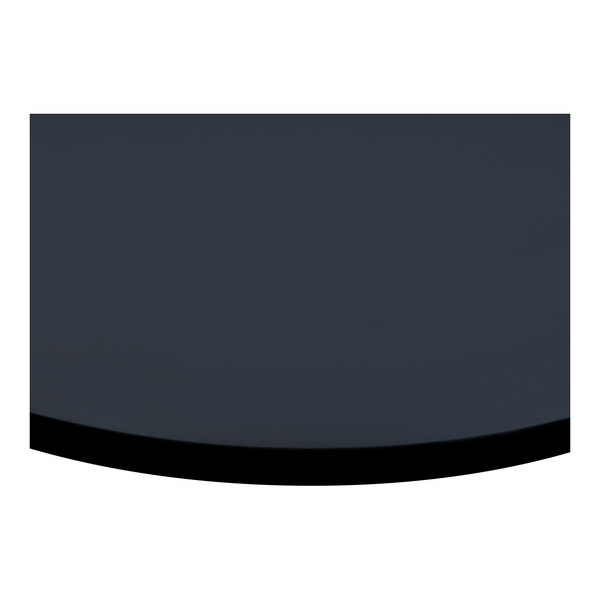 A round, black 30-inch melamine table top with a matching edge.