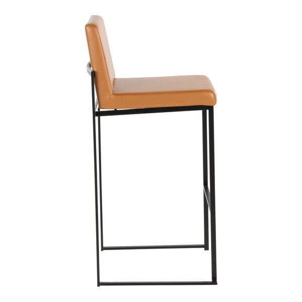 A high-back barstool with a black metal frame and camel faux leather seat and back.