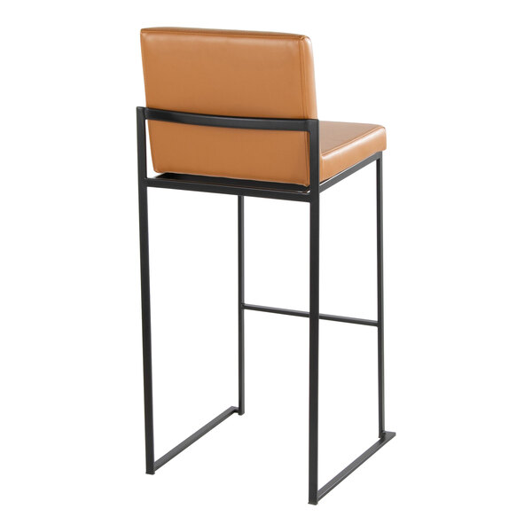A high-back barstool with a black metal frame and camel faux leather back and seat.