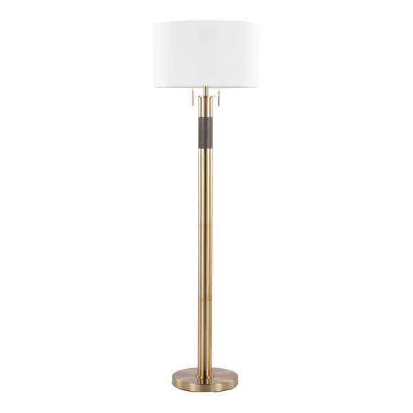 A gold floor lamp with a white linen drum shade.