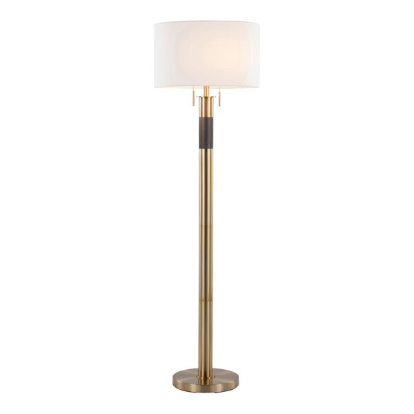 A gold floor lamp with a white linen drum shade.