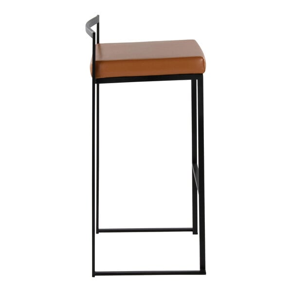 A modern barstool with a black metal frame and a camel faux leather seat.