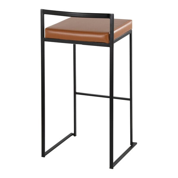 A modern barstool with a black metal frame and a camel faux leather seat.