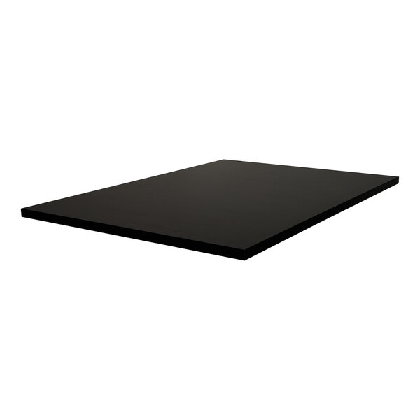 A rectangular black melamine table top with matching edge, measuring 30 by 60 inches and 1 inch thick.