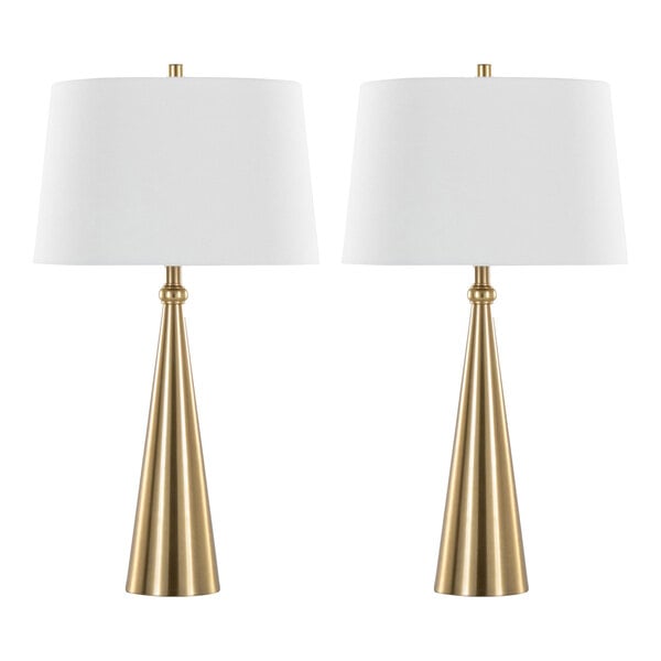 A pair of gold cone-shaped table lamps with white linen drum shades.