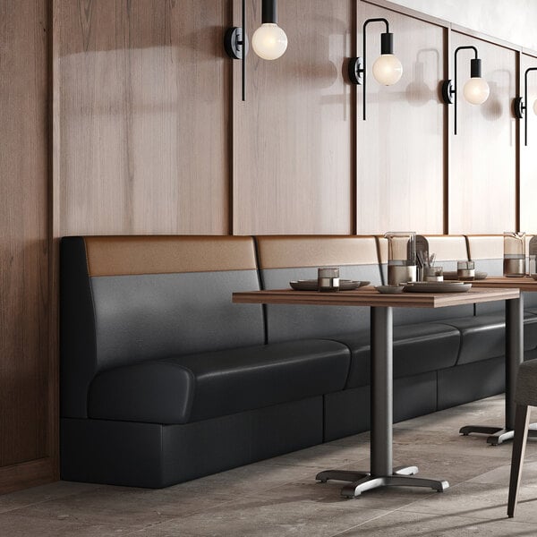 A 60-inch long, 36-inch high single back cafe booth with a head roll, upholstered in two-tone material.