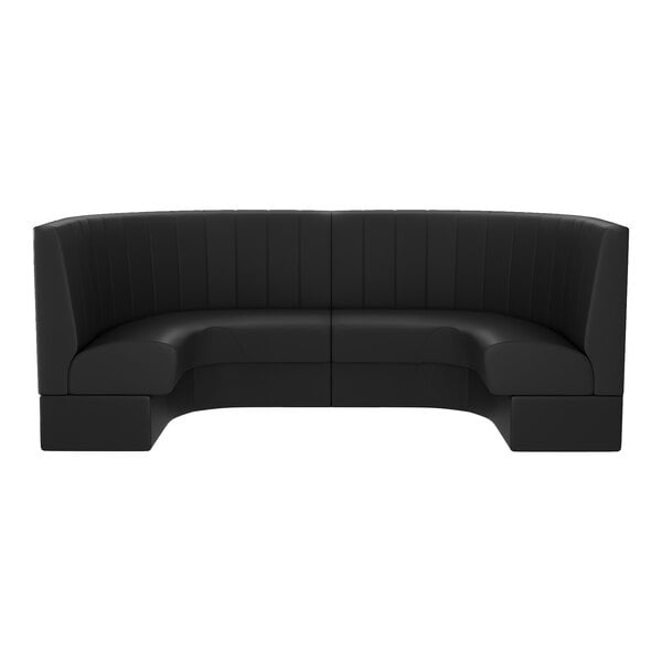 A large, black, semi-circular booth with high backrest and channel tufting.