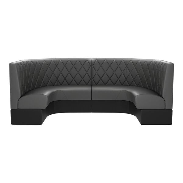A graphite-colored, diamond-tufted, half-circle booth with a high back and modern design.