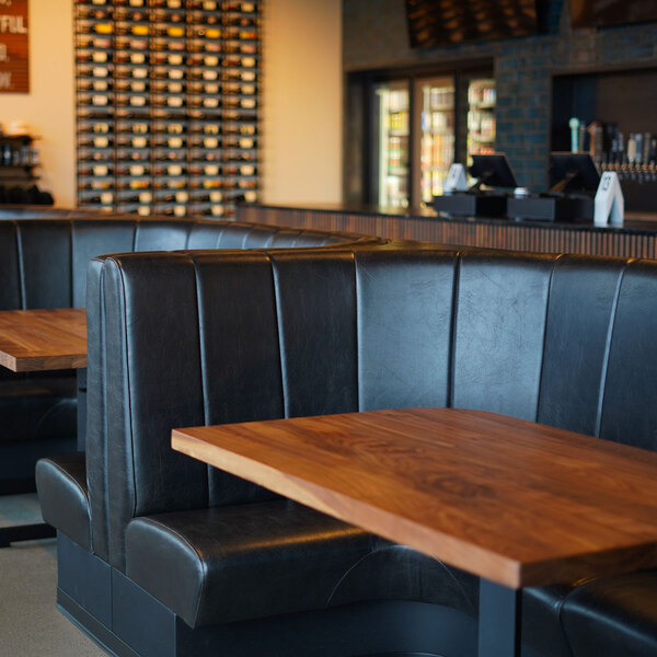 A 48-inch long, 42-inch high ebony channel quarter-circle corner booth with a wooden table, designed for restaurant seating.