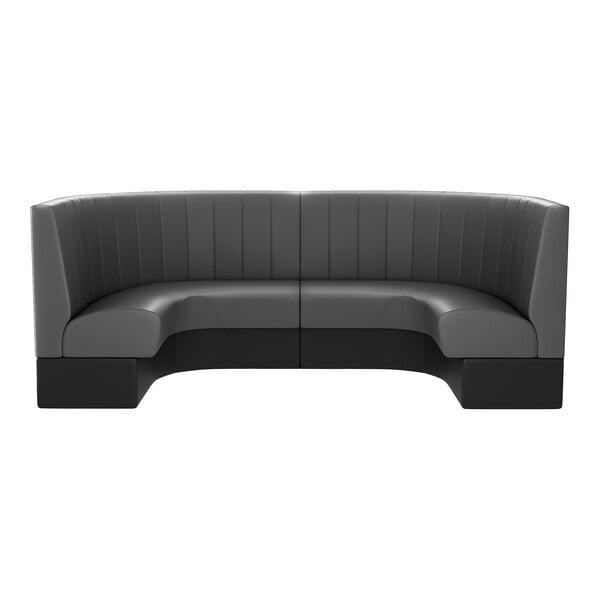 A large graphite-colored, half-circle booth with channel tufting and a high backrest.