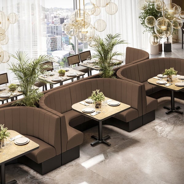 A large brown 3/4 circle booth with channel tufting and a 42-inch high back, designed for cafe or restaurant seating.