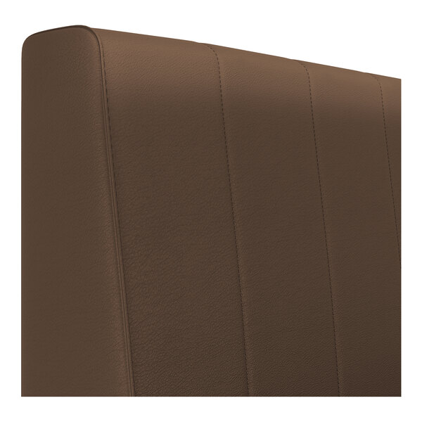 A brown upholstered booth backrest with vertical channel stitching.