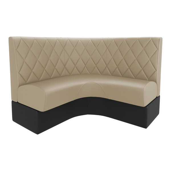 A beige diamond-tufted quarter circle corner booth with a black base and high backrest.