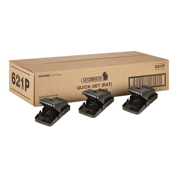 A box of Catchmaster 621P Snapper Quickset rat traps with three black plastic traps displayed in front.