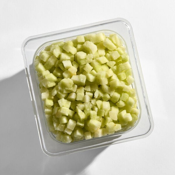 A container of individually quick frozen (IQF) diced Granny Smith apples.