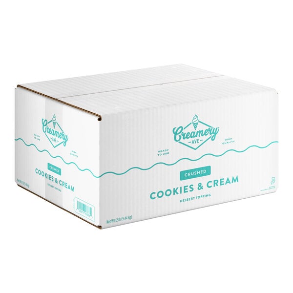 A large box of Creamery Ave. crushed cookies and cream dessert topping.