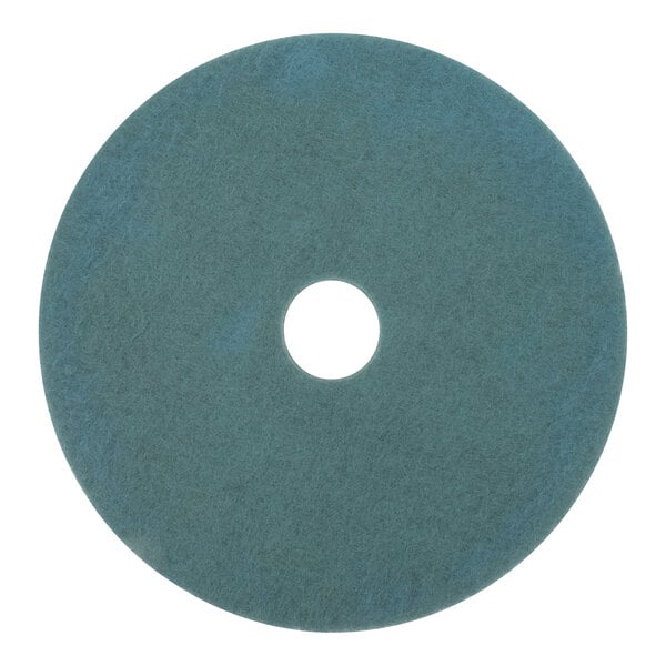 A round, aqua-colored high-frequency burnishing floor pad with a central hole.