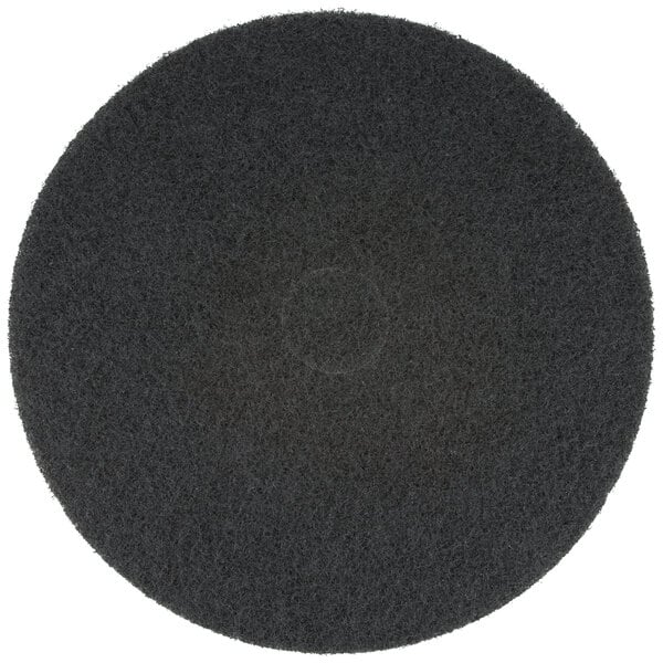 A round, black floor stripping pad designed for use with floor cleaning machines.