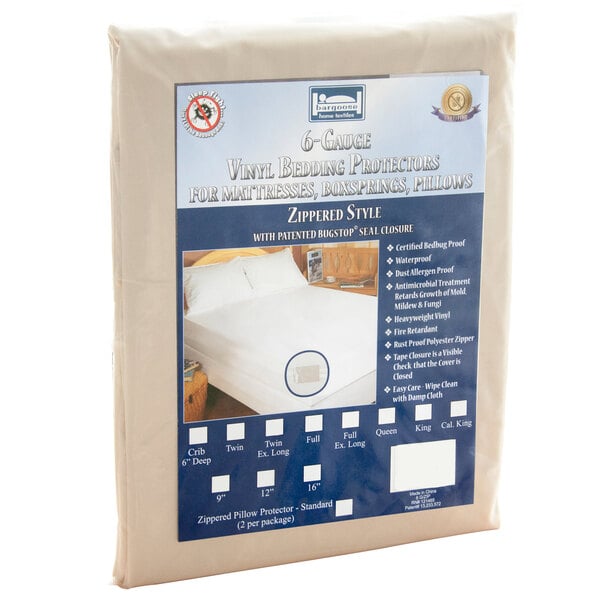 A package of king size 6-gauge vinyl waterproof white mattress protectors.