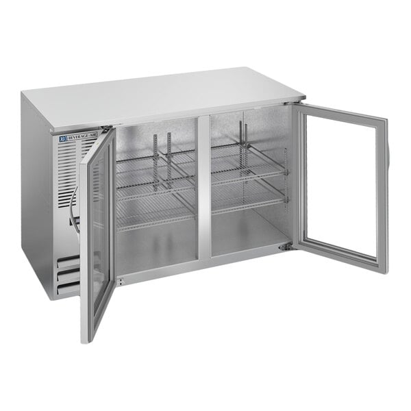 A stainless steel underbar height back bar refrigerator with glass doors and interior shelving.