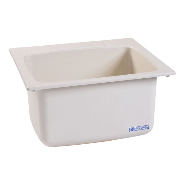A rectangular biscuit-colored fiberglass drop-in utility sink with a 1 1/2 inch drain opening.