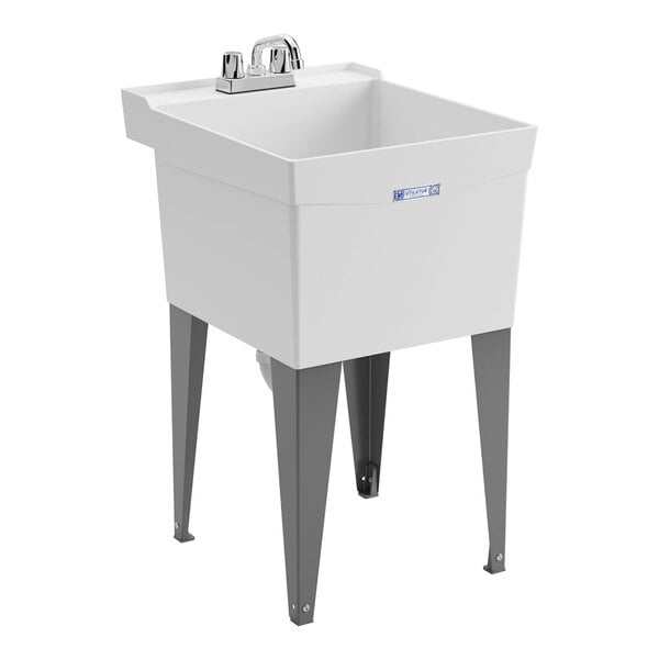 A white thermoplastic utility laundry tub sink with steel legs and a chrome faucet kit.