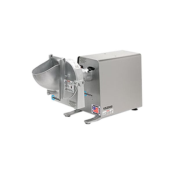A metal machine with a large, curved chute and a rectangular base, featuring control labels and a small American flag sticker on the side.